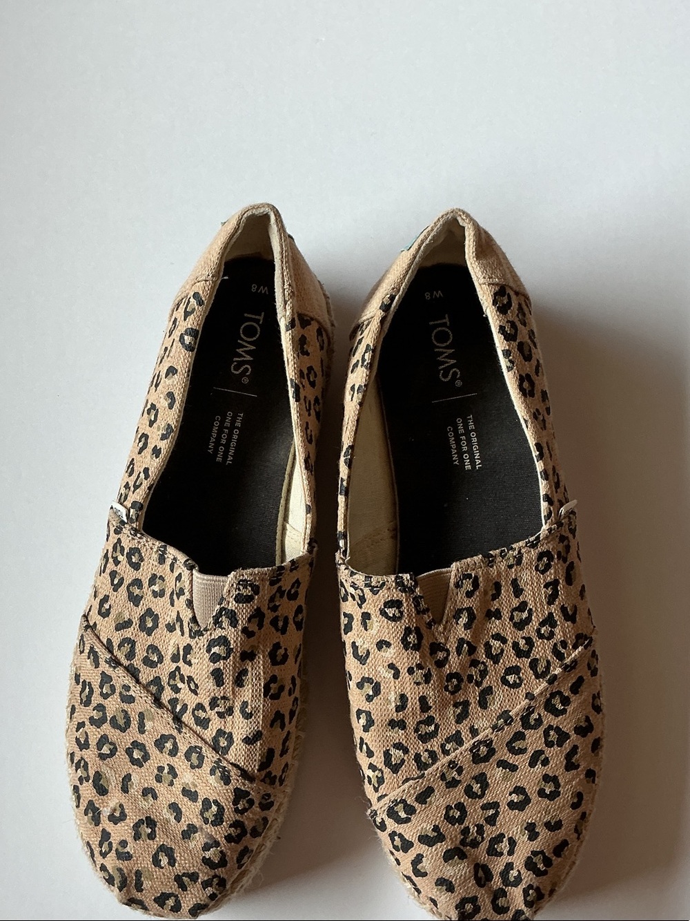 TOMS Leopard Print Canvas Slip-Ons in Tan and Black